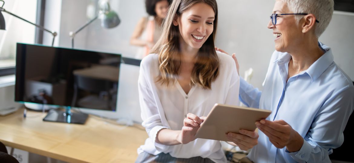 Group of successful business people at work in office